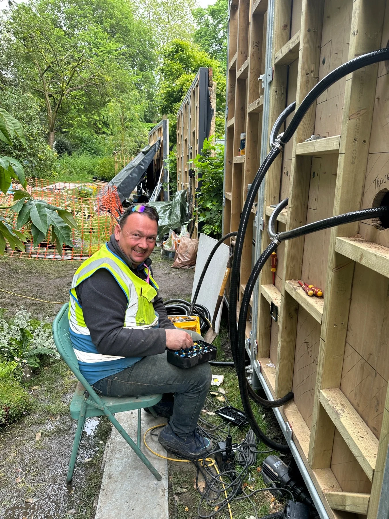 BIG Fish Landscapes contractor working on the garden build services at RHS Chelsea Flower Show 2024